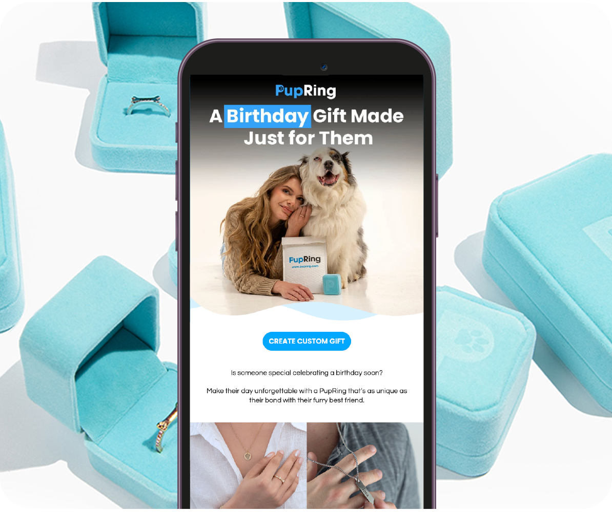 PupRing birthday email on a phone, surrounded by PupRing gift boxes